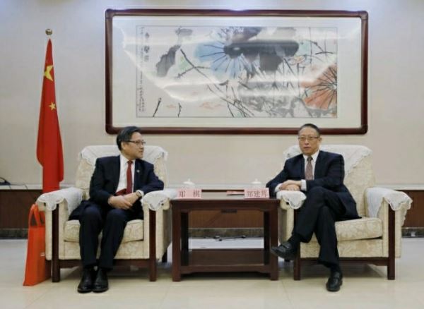 全国政协副主席、民革中央常务副主席郑建邦会见美国侨商联合会郑棋主席